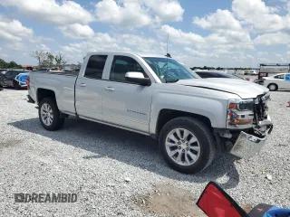 2018 Chevrolet Silverado 1500 LT with VIN 1GCRCREC1JZ354936, listed as a Copart auction lot 50747775 with 129,362 mi miles and Salvage Title. Bid and sale history available at DreamBid. Image 4.