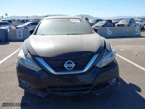 2018 Nissan Altima 2.5 SL with VIN 1N4AL3AP8JC187356, listed as a IAAI auction lot 40610711 with 98,662 mi miles. Bid and sale history available at carsss.com. Image 12.
