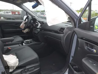 2022 Honda Pilot Touring 7-Passenger with VIN 5FNYF6H68NB056077, listed as a IAAI auction lot 42357338 with 18,193 mi miles and . Bid and sale history available at DreamBid. Image 5.