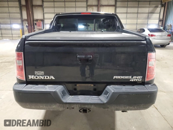 2010 Honda Ridgeline RTL with VIN 5FPYK1F5XAB011944, listed as a Copart auction lot 52434175 with 137,585 mi miles and Salvage title. Bid and sale history available at DreamBid. Image 6.