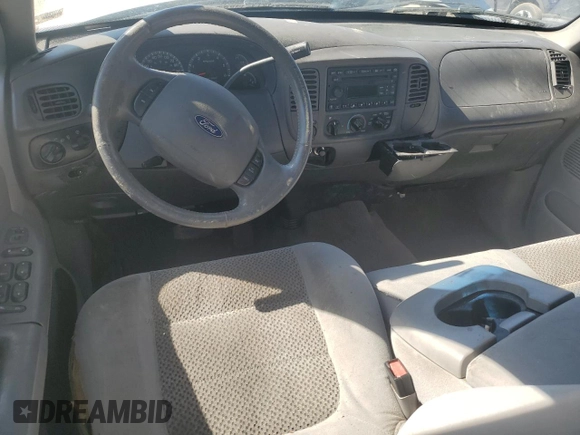 2003 Ford F-150 XLT with VIN 1FTRW08L03KD74119, listed as a Copart auction lot 47373105 with 303,513 mi miles and Salvage Title. Bid and sale history available at carsss.com. Image 8.