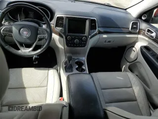2017 Jeep Grand Cherokee Summit with VIN 1C4RJFJT8HC723895, listed as a Copart auction lot 53960565 with 115,252 mi miles and Salvage title. Bid and sale history available at DreamBid. Image 8.
