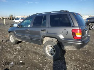2003 Jeep Grand Cherokee Limited z VIN 1J8GW58N73C502929, wystawiony jako Copart lot #79472734 z przebiegiem 231 176 mil mil oraz Szkoda całkowita • Salvage title. Historia ofert i sprzedaży dostępna na DreamBid. Obrazek 2.