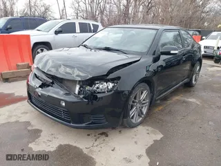 2012 Scion tC with VIN JTKJF5C72C3024241, listed as a IAAI auction lot 41750123 with 136,695 mi miles. Bid and sale history available at carsss.com. Image 2.