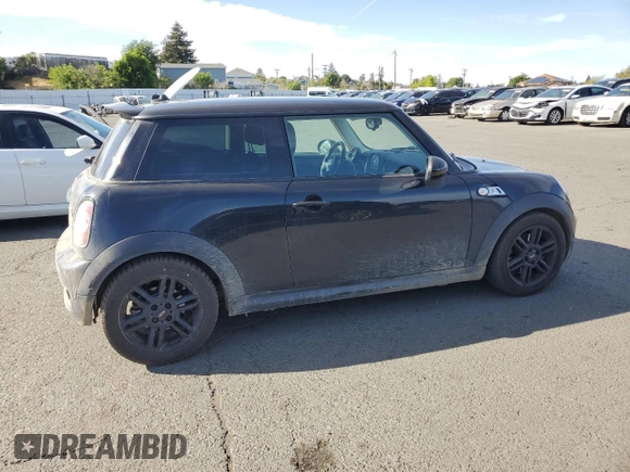 2012 MINI Hardtop S with VIN WMWSV3C54CT386098, listed as a Copart auction lot 52742075 with 119,432 mi miles and Salvage Title. Bid and sale history available at DreamBid. Image 3.