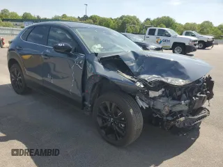 2024 Mazda CX-30 S Carbon Edition z VIN 3MVDMBCM1RM659830, wystawiony jako Copart lot #56556985 z przebiegiem 20 048 mil mil oraz Szkoda całkowita • Salvage title. Historia ofert i sprzedaży dostępna na DreamBid. Obrazek 4.