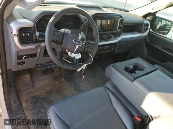2023 Ford F-150 XL with VIN 1FTMF1C59PKE40505, listed as a Copart auction lot 87022404 with Not Provided miles and Salvage Title. Bid and sale history available at carsss.com. Image 8.