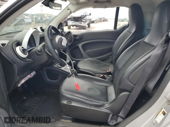 2016 Smart fortwo Passion with VIN WMEFJ5DAXGK084125, listed as a Copart auction lot 59374855 with 63,826 mi miles and Salvage title. Bid and sale history available at DreamBid. Image 7.