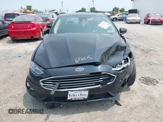 2020 Ford Fusion SE with VIN 3FA6P0LU5LR142665, listed as a IAAI auction lot 42415611 with 101,686 mi miles and . Bid and sale history available at DreamBid. Image 11.
