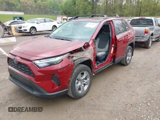 2023 Toyota RAV4 Hybrid XLE with VIN 4T3RWRFV0PU089720, listed as a IAAI auction lot 42016001 with 19,499 mi miles. Bid and sale history available at carsss.com. Image 6.