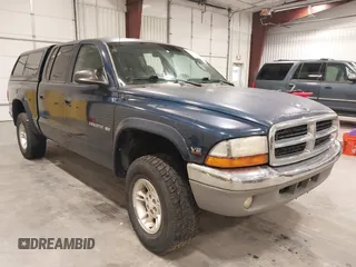 2000 Dodge Dakota Sport z VIN 1B7GG2AN6YS636308, wystawiony jako IAAI lot #42405180 z przebiegiem 171 266 mil mil oraz . Historia ofert i sprzedaży dostępna na DreamBid. Obrazek 1.