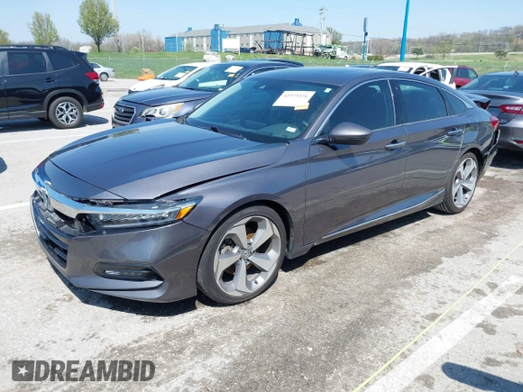 2019 Honda Accord Touring with VIN 1HGCV2F92KA016179, listed as a IAAI auction lot 41975156 with 101,674 mi miles and . Bid and sale history available at DreamBid. Image 2.