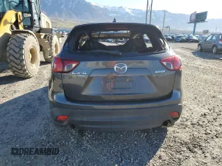 2015 Mazda CX-5 Touring with VIN JM3KE4CYXF0515106, listed as a Copart auction lot 50451185 with 0 mi miles and Salvage Title. Bid and sale history available at carsss.com. Image 6.