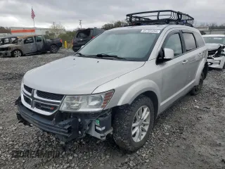 2013 Dodge Journey SXT with VIN 3C4PDDBG4DT571262, listed as a Copart auction lot 86795494 with 163,699 mi miles and Salvage title. Bid and sale history available at DreamBid. Image 1.