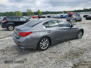 2014 Infiniti Q50 Premium with VIN JN1BV7APXEM675338, listed as a Copart auction lot 57125045 with 58,267 mi miles and Salvage title. Bid and sale history available at DreamBid. Image 3.