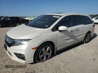 2018 Honda Odyssey EX-L with VIN 5FNRL6H72JB005268, listed as a Copart auction lot 50263645 with 136,036 mi miles and Salvage Title. Bid and sale history available at carsss.com. Image 1.