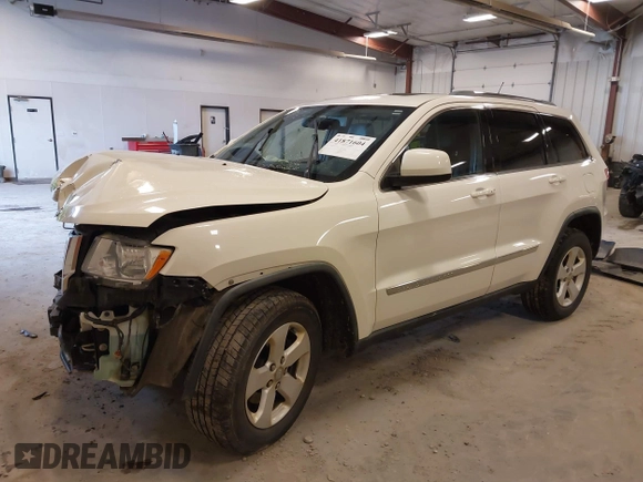 2011 Jeep Grand Cherokee 70th Anniversary with VIN 1J4RR4GG4BC702759, listed as a IAAI auction lot 41871604 with 143,583 mi miles. Bid and sale history available at carsss.com. Image 2.