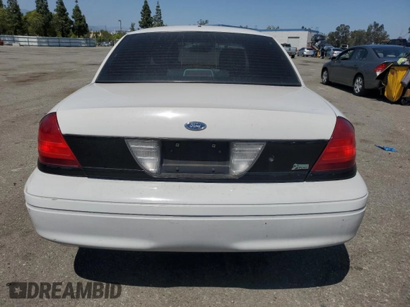 2011 Ford Police Interceptor with VIN 2FABP7BV4BX167977, listed as a Copart auction lot 61819025 with 104,769 mi miles and Salvage title. Bid and sale history available at DreamBid. Image 6.