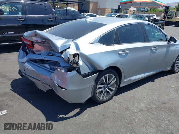 2020 Honda Accord with VIN 1HGCV3F11LA002534, listed as a IAAI auction lot 42537701 with 115,166 mi miles and . Bid and sale history available at DreamBid. Image 4.
