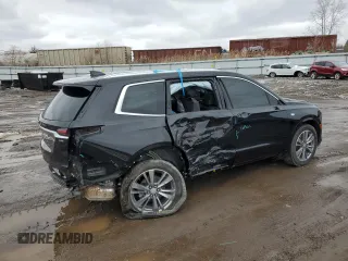 2022 Cadillac XT6 Premium Luxury z VIN 1GYKPDRS9NZ160942, wystawiony jako Copart lot #44256595 z przebiegiem 25 144 mil mil oraz Szkoda całkowita • Salvage title. Historia ofert i sprzedaży dostępna na DreamBid. Obrazek 3.
