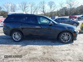 2023 Dodge Durango GT with VIN 1C4RDJDG1PC681982, listed as a IAAI auction lot 41633313 with 53,069 mi miles and . Bid and sale history available at DreamBid. Image 12.