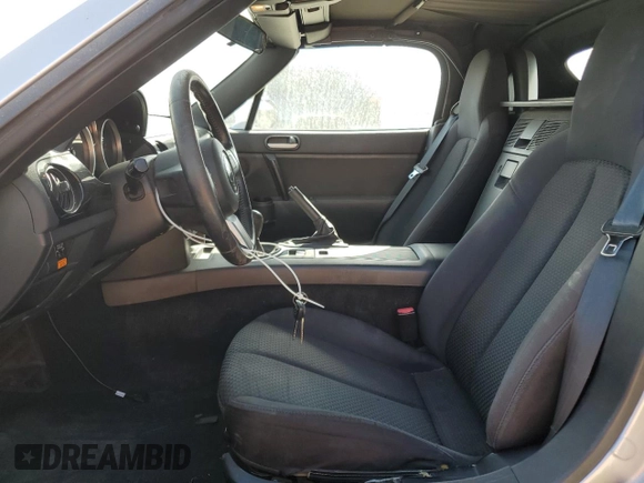 2007 Mazda MX-5 Miata Sport with VIN JM1NC25F470128936, listed as a Copart auction lot 45424585 with 123,910 mi miles and Salvage title. Bid and sale history available at DreamBid. Image 7.
