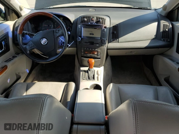 2004 Cadillac CTS with VIN 1G6DM577040103840, listed as a Copart auction lot 55284675 with 113,007 mi miles and Salvage title. Bid and sale history available at DreamBid. Image 8.