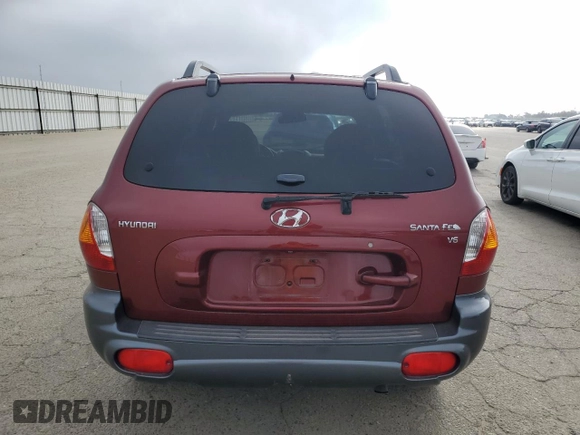 2002 Hyundai Santa Fe GLS with VIN KM8SC13D02U173092, listed as a Copart auction lot 87683115 with 96,950 mi miles and Salvage Title. Bid and sale history available at carsss.com. Image 6.