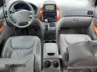 2010 Toyota Sienna XLE with VIN 5TDYK4CC1AS322395, listed as a Copart auction lot 60520215 with 148,725 mi miles and Salvage title. Bid and sale history available at DreamBid. Image 8.