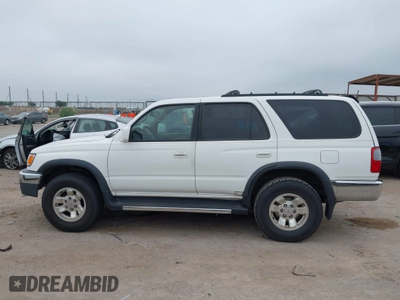 1999 Toyota 4Runner SR5 with VIN JT3GN86R4X0097609, listed as a IAAI auction lot 42370857 with 244,297 mi miles and . Bid and sale history available at DreamBid. Image 14.