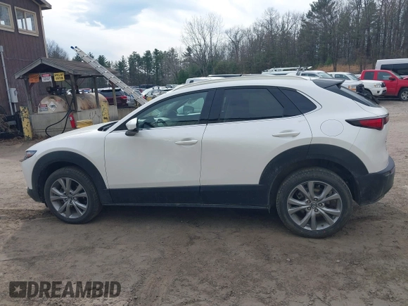 2021 Mazda CX-30 Premium with VIN 3MVDMBDM8MM216520, listed as a IAAI auction lot 41848596 with 60,353 mi miles and . Bid and sale history available at DreamBid. Image 14.