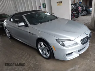 2014 BMW 6 Series 650i xDrive z VIN WBAYP1C54ED216684, wystawiony jako IAAI lot #42447244 z przebiegiem 116 011 mil mil oraz . Historia ofert i sprzedaży dostępna na DreamBid. Obrazek 1.