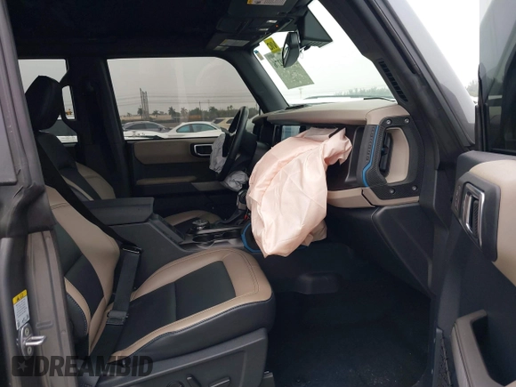 2023 Ford Bronco with VIN 1FMEE5DPXPLC01694, listed as a IAAI auction lot 41389276 with 10,512 mi miles. Bid and sale history available at carsss.com. Image 5.