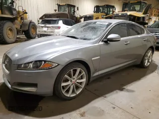 2015 Jaguar XF with VIN SAJXJ0EF1F8U48283, listed as a Copart auction lot 81004054 with 77,828 mi miles and Clean Title. Bid and sale history available at DreamBid. Image 1.