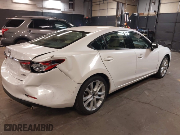 2014 Mazda Mazda6 i Touring with VIN JM1GJ1V68E1147067, listed as a IAAI auction lot 42105878 with 102,684 mi miles. Bid and sale history available at carsss.com. Image 4.
