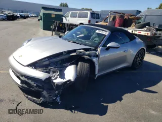 2020 Porsche 911 Carrera S with VIN WP0CB2A9XLS262651, listed as a Copart auction lot 76948374 with 25,800 mi miles and Salvage Title. Bid and sale history available at carsss.com. Image 1.