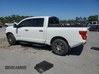 2021 Nissan Titan SV с VIN 1N6AA1EDXMN527522, выставлен на аукционе Copart как лот 52826715 с пробегом 79 450 миль миль и Списание • Salvage title. История ставок и продаж доступна на DreamBid. Изображение 2.