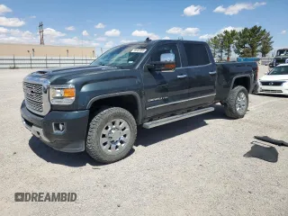 2018 GMC Sierra 2500HD Denali with VIN 1GT12UEYXJF107009, listed as a Copart auction lot 56063085 with 95,835 mi miles and Salvage title. Bid and sale history available at DreamBid. Image 1.