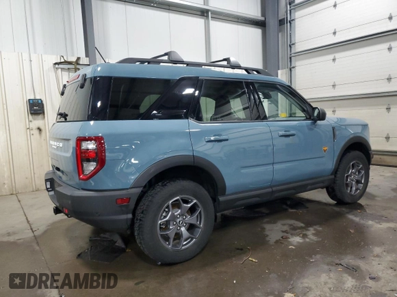 2023 Ford Bronco Sport Badlands z VIN 3FMCR9D91PRE01918, wystawiony jako Copart lot #52120145 z przebiegiem 8 415 mil mil oraz Szkoda całkowita • Salvage title. Historia ofert i sprzedaży dostępna na DreamBid. Obrazek 3.