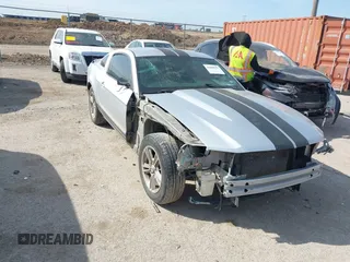 2012 Ford Mustang Premium with VIN 1ZVBP8AM5C5234532, listed as a IAAI auction lot 41860791 with 106,929 mi miles and . Bid and sale history available at DreamBid. Image 1.