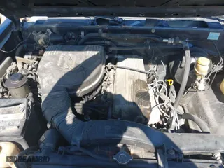 1997 Nissan Trucks 2WD XE with VIN 1N6SD16S8VC423231, listed as a IAAI auction lot 41609302 with 233,168 mi miles. Bid and sale history available at carsss.com. Image 10.
