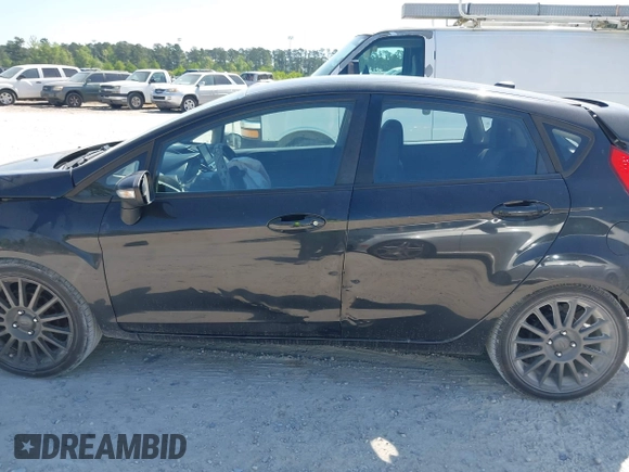 2013 Ford Fiesta SE with VIN 3FADP4EJ3DM218898, listed as a IAAI auction lot 42038436 with 177,193 mi miles and . Bid and sale history available at DreamBid. Image 14.