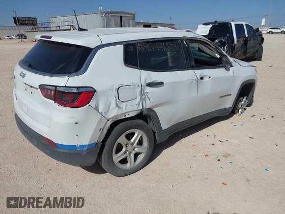 2023 Jeep Compass Sport with VIN 3C4NJDAN8PT564612, listed as a IAAI auction lot 41639296 with 54,463 mi miles and . Bid and sale history available at DreamBid. Image 4.