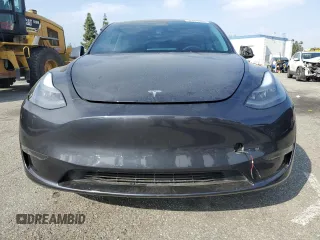 2024 Tesla Model Y Long Range with VIN 7SAYGDEE2RA244242, listed as a Copart auction lot 52635095 with 4,994 mi miles and Salvage title. Bid and sale history available at DreamBid. Image 5.