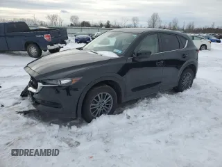 2019 Mazda CX-5 Touring with VIN JM3KFBCM0K0607933, listed as a Copart auction lot 46260815 with 64,349 mi miles and Salvage Title. Bid and sale history available at carsss.com. Image 1.