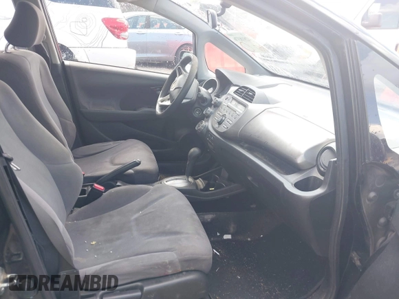 2009 Honda Fit with VIN JHMGE88249S053398, listed as a IAAI auction lot 42818376 with 242,218 mi miles and . Bid and sale history available at DreamBid. Image 5.