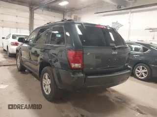 2007 Jeep Grand Cherokee Laredo with VIN 1J8GS48K87C615693, listed as a IAAI auction lot 41949521 with 206,058 mi miles. Bid and sale history available at carsss.com. Image 6.