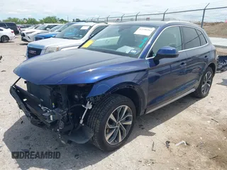 2021 Audi Q5 Premium with VIN WA1AAAFY7M2004975, listed as a IAAI auction lot 42190283 with 56,810 mi miles and . Bid and sale history available at DreamBid. Image 2.