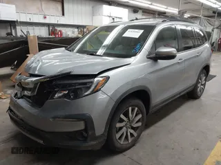 2021 Honda Pilot EX-L with VIN 5FNYF5H52MB022782, listed as a IAAI auction lot 41830003 with 39,945 mi miles. Bid and sale history available at carsss.com. Image 2.