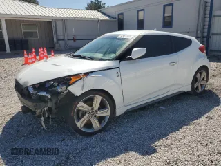 2014 Hyundai Veloster Turbo z VIN KMHTC6AE0DU162755, wystawiony jako Copart lot #52922585 z przebiegiem 125 986 mil mil oraz Tytuł czysty. Historia ofert i sprzedaży dostępna na DreamBid. Obrazek 1.